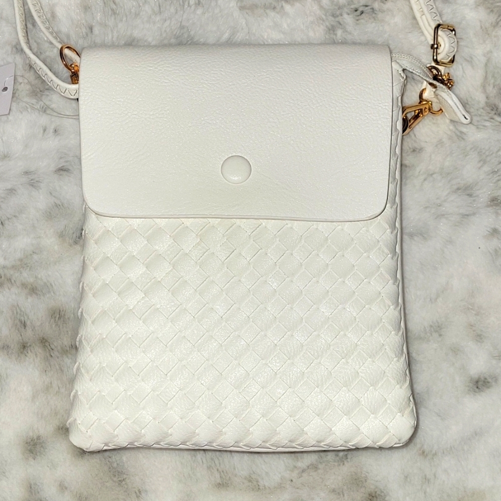 White large weave crossbody purse. Very soft.